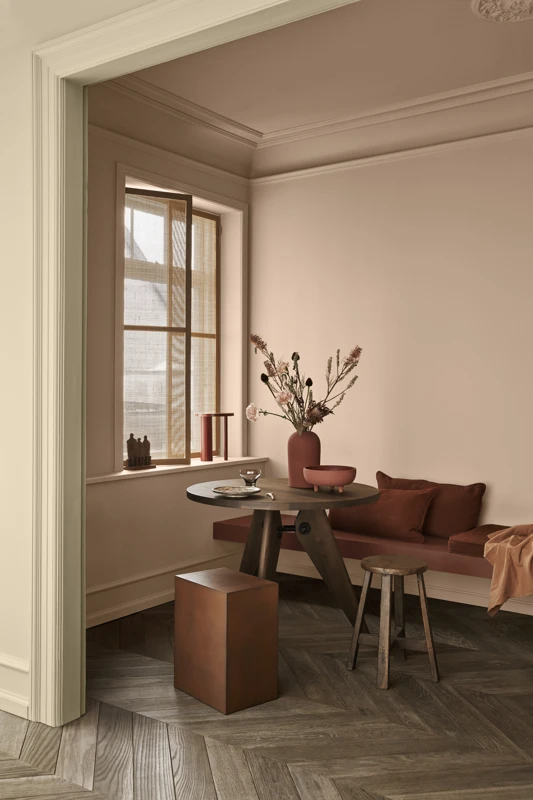 Living room painted with Jotun interior paint Desert Pink, Welcoming red and Hummus