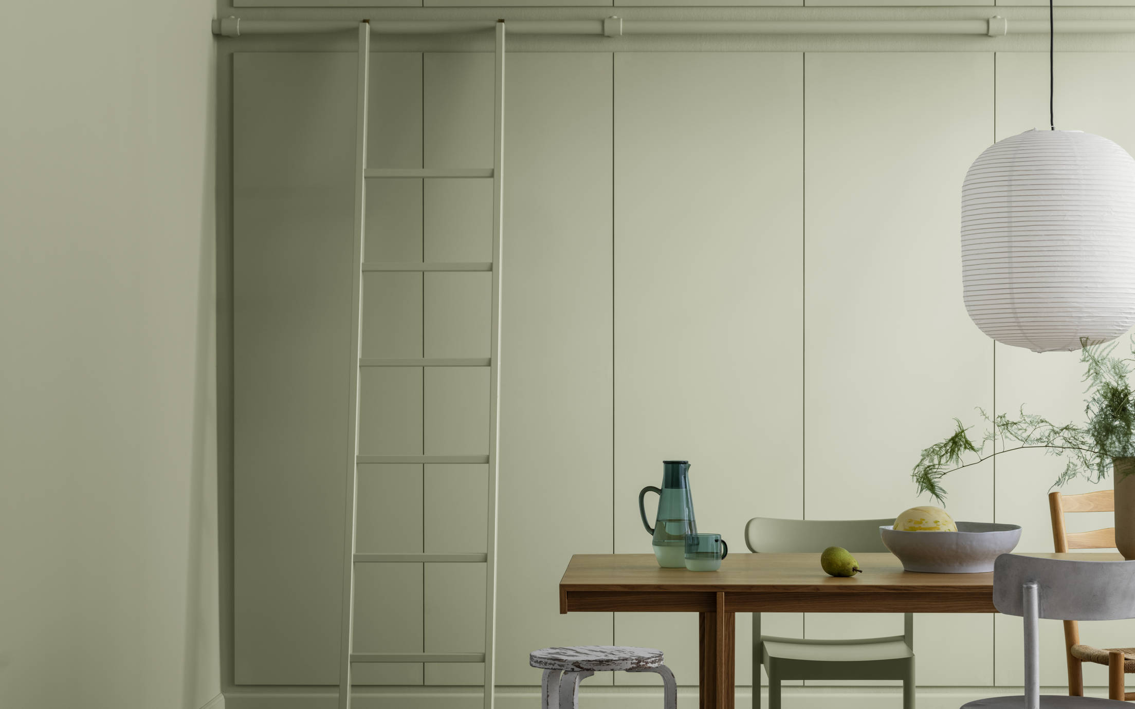 Dining area painted with Jotun Dusk green 3241 interior paint