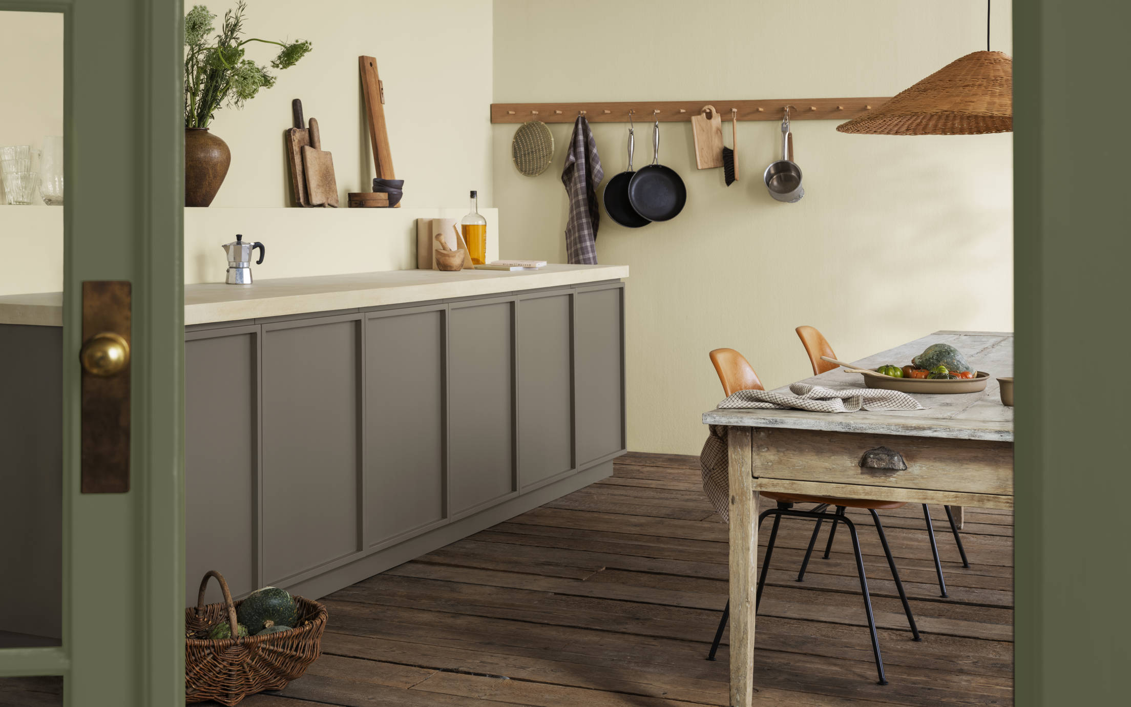 Kitchen painted with Jotun soft rustic brown and natural green interior paints