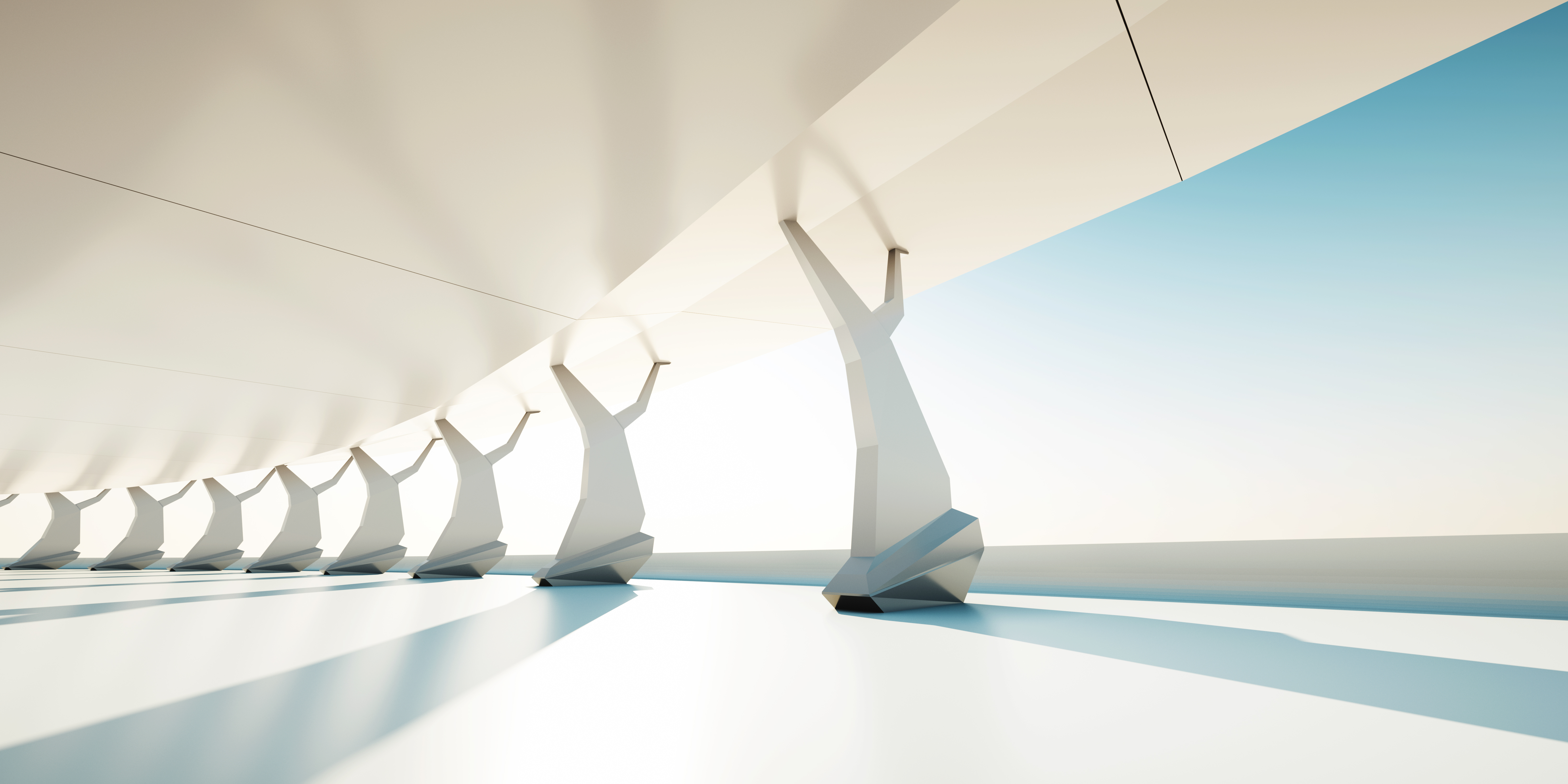 Building covered in high-shine metallic effect coating from Jotun, bathed in sunshine.