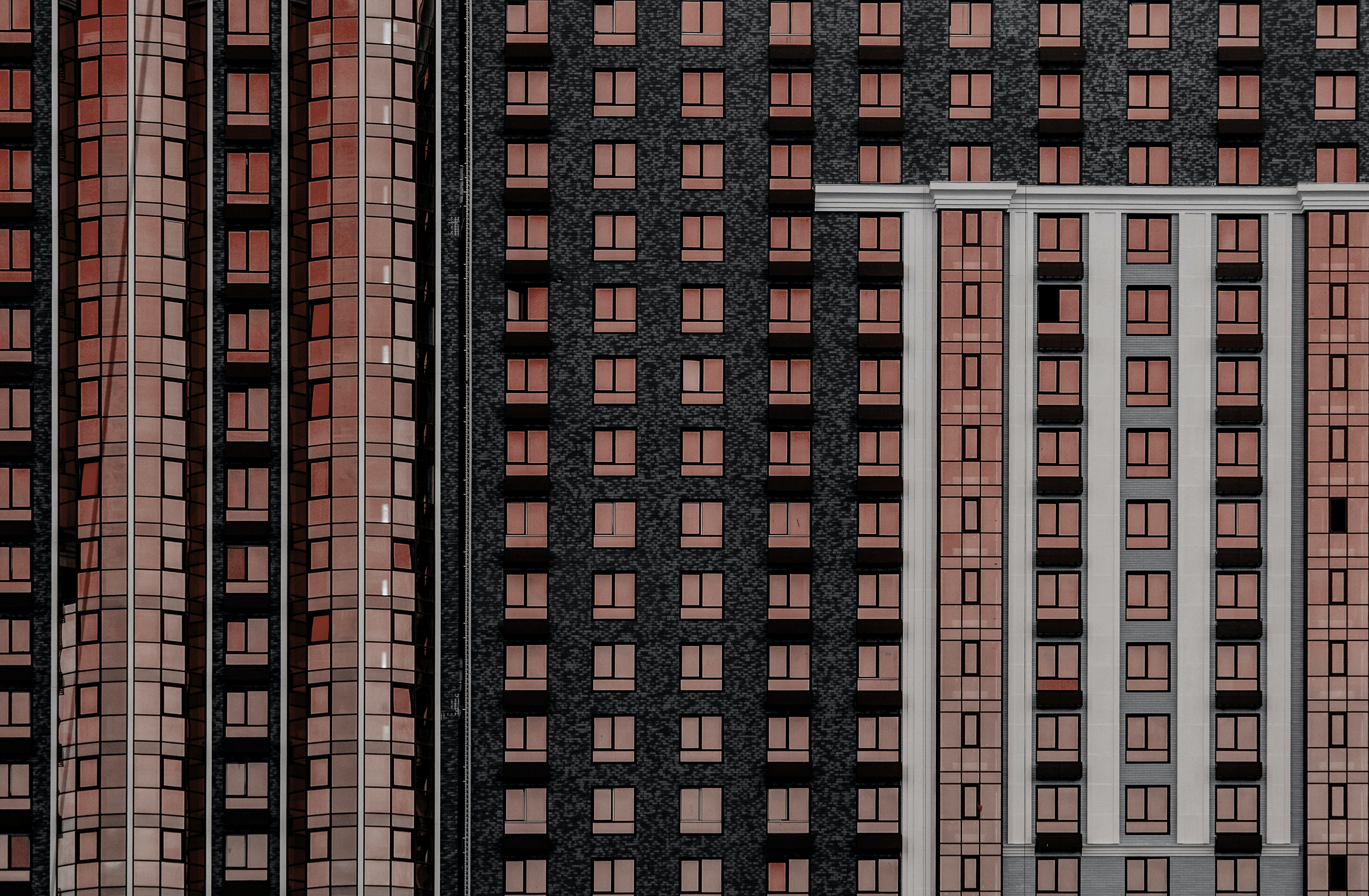 Buildings in red and black with many windows