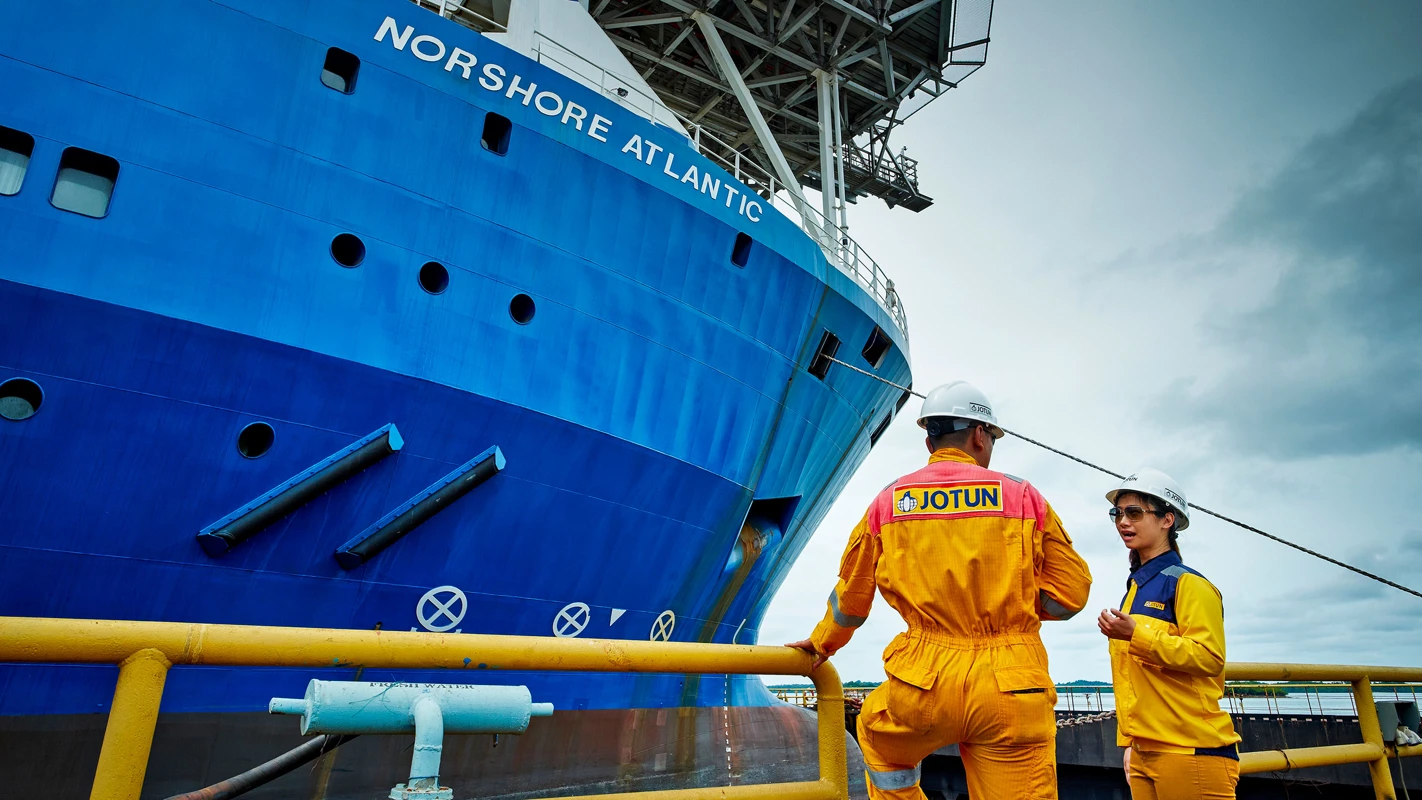 Two members of our Technical Servise team at a ship yard