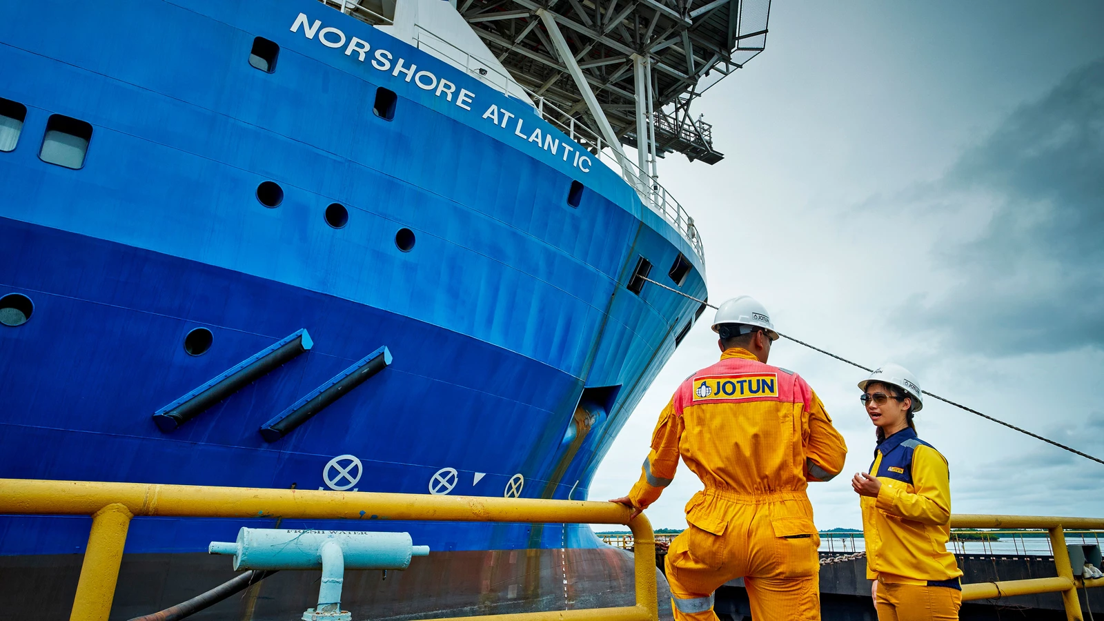Two members of our Technical Servise team at a ship yard